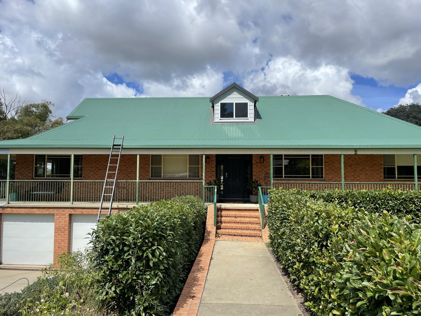 Faded country roof before green respray